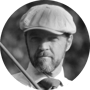 Portrait of Paolo Quirici in 1930s golf attire, holding a hickory club.